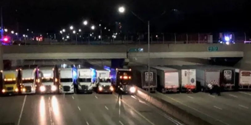 13 Truck Drivers Turn Heads After Blocking Highway To Form ‘Safety Net’