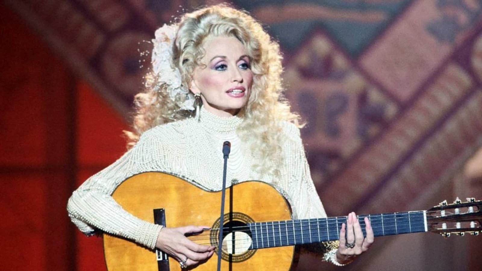 Dolly Parton’s Recently Posted “Coat of Many Colors” Throwback Has Everyone Crying Again