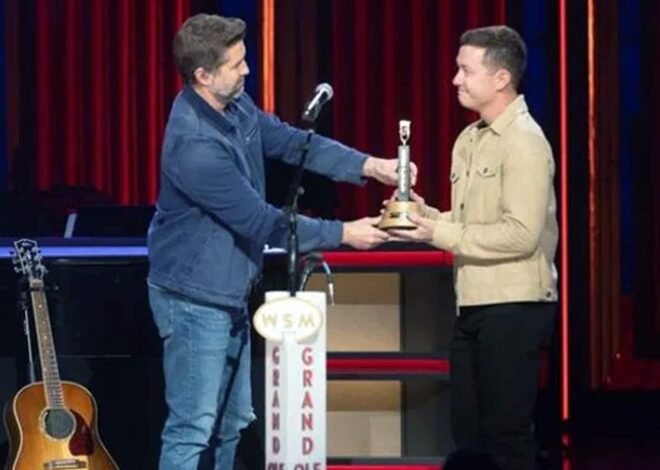 Grand Ole Opry Unveils ‘Who’s Gonna Fill Their Shoes’ Display for Scotty McCreery, Josh Turner, and Randy Travis