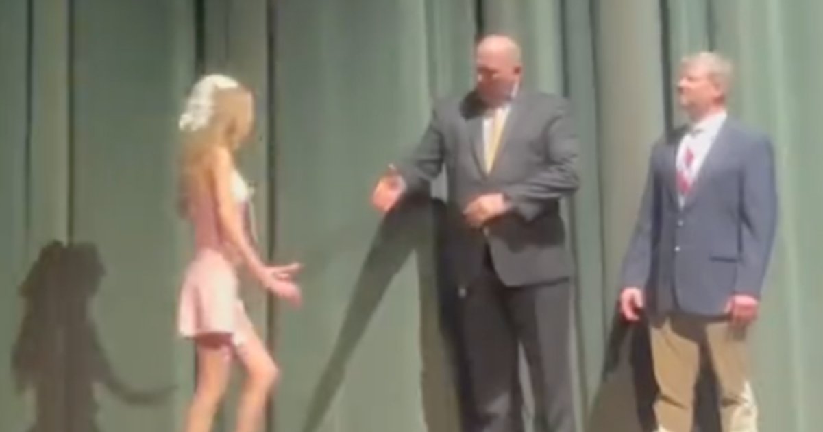 Heartbreaking reason girl refuses handshake from principal at graduation