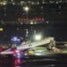 Two pilots dead, two Port Authority cops seriously injured at LaGuardia as flight, emergency vehicle collide: sources