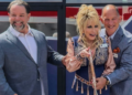Dolly Parton Cuts Ribbon, Officially Opens Her Tennessean Travel Stop