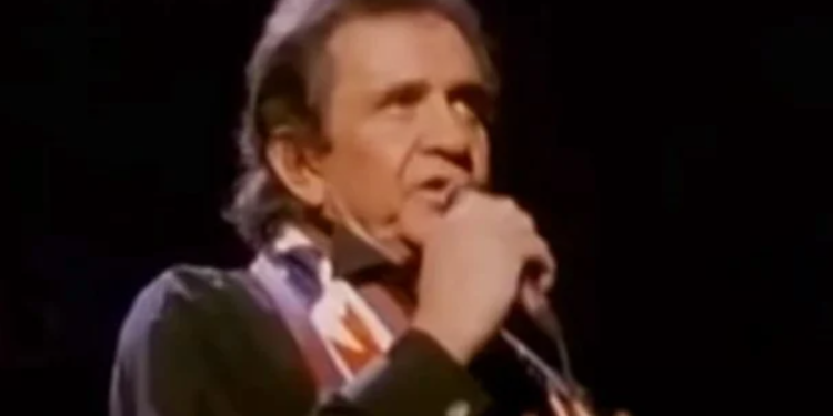 Johnny Cash Shows Patriotism & Respect For Old Glory In “Ragged Old Flag”
