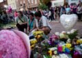 Fans Gather At Dolly Parton’s Statue To Pay Tribute After Her Death